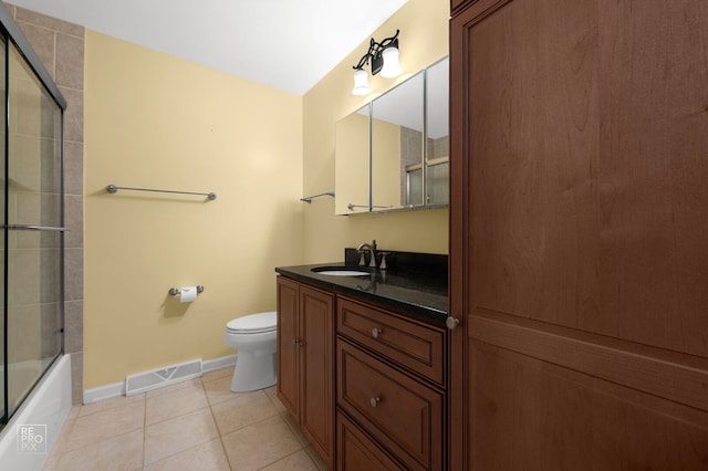 902 E Plate Dr, Palatine, IL 60074 - full bathroom with vanity, tile patterned flooring, and enclosed tub / shower combo