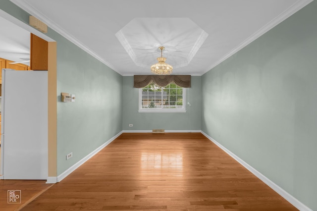 902 E Plate Dr, Palatine, IL 60074 - spare room featuring a chandelier, light wood-style floors, and crown molding