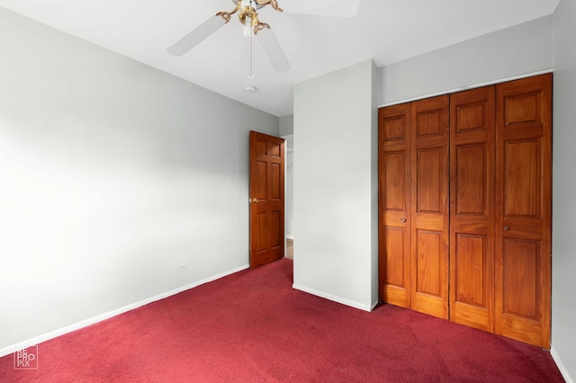 902 E Plate Dr, Palatine, IL 60074 - unfurnished bedroom with dark carpet, a closet, and ceiling fan