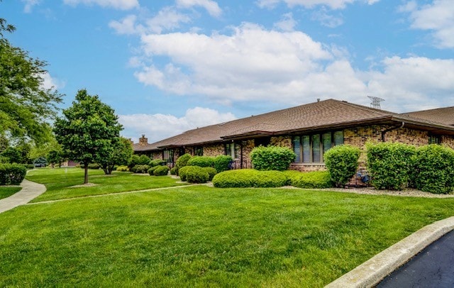 16052 Eagle Ridge Dr, Tinley Park, IL 60477 - view of front facade with a front lawn and brick siding