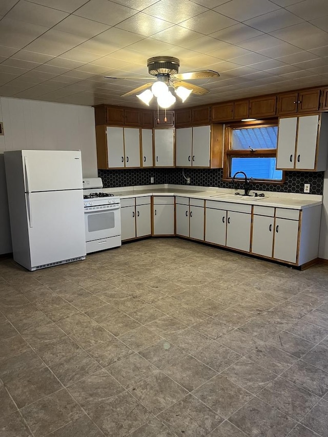 1112 1st Ave, Ottawa, IL 61350 - kitchen with white appliances, a sink, tasteful backsplash, and a ceiling fan