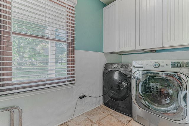 25647 W Old Grand Ave, Ingleside, IL 60041 - clothes washing area with cabinet space, independent washer and dryer, plenty of natural light, and light tile patterned flooring