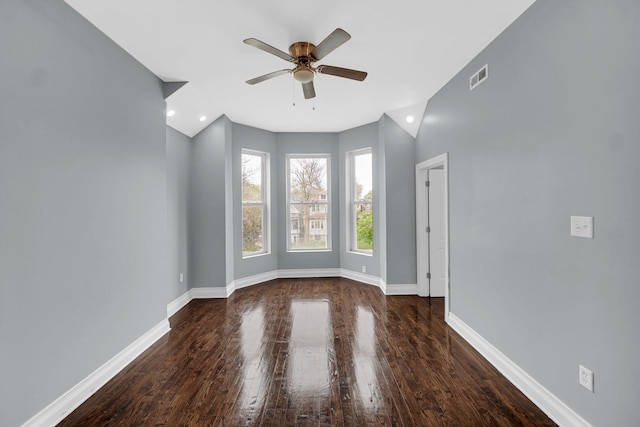 7223 S Union Ave, Chicago, IL 60621 - spare room featuring a ceiling fan, dark wood-style floors, baseboards, and vaulted ceiling