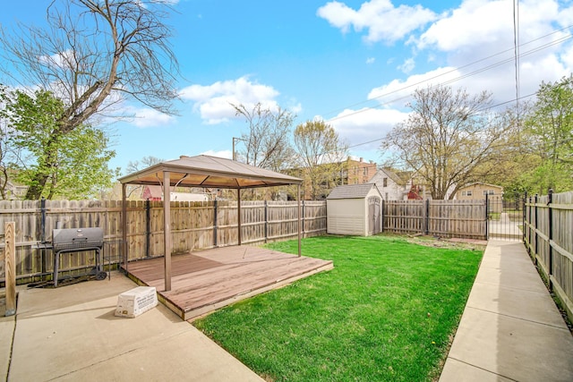 7223 S Union Ave, Chicago, IL 60621 - view of yard featuring a gazebo, a shed, a wooden deck, an outdoor structure, and a patio
