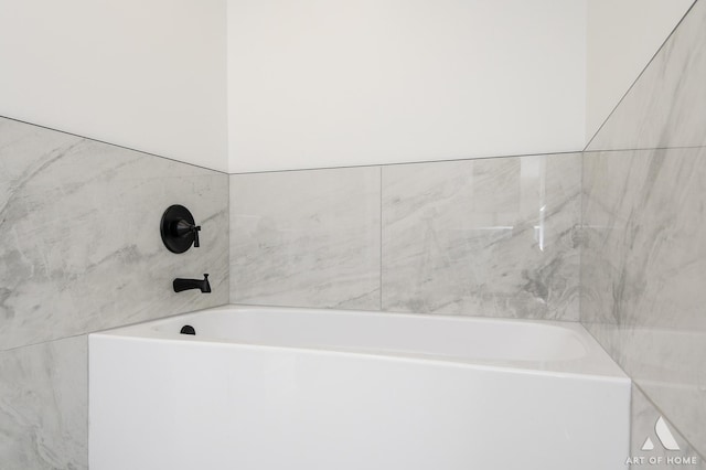 full bathroom featuring a tub to relax in