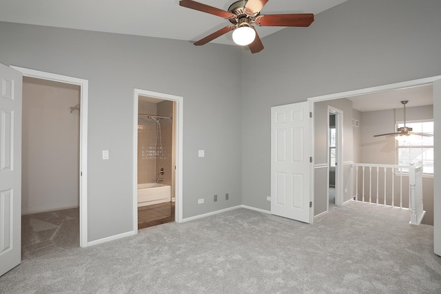 1224 Clearview Ct, Buffalo Grove, IL 60089 - unfurnished bedroom featuring a walk in closet, carpet flooring, baseboards, ensuite bathroom, and ceiling fan