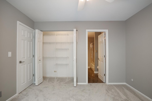 1224 Clearview Ct, Buffalo Grove, IL 60089 - unfurnished bedroom with carpet flooring, baseboards, ensuite bath, a ceiling fan, and a closet