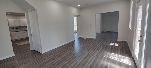407 Allen St, Belvidere, IL 61008 - unfurnished room featuring dark wood-style floors, baseboards, and recessed lighting