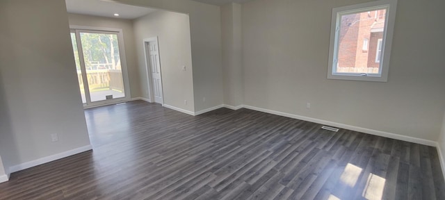 407 Allen St, Belvidere, IL 61008 - unfurnished room with dark wood finished floors, baseboards, and recessed lighting