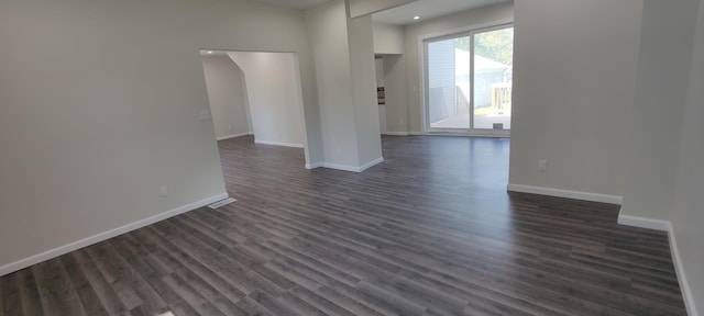 407 Allen St, Belvidere, IL 61008 - empty room with dark wood-style floors, baseboards, and recessed lighting