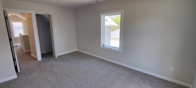 407 Allen St, Belvidere, IL 61008 - unfurnished bedroom with carpet and baseboards