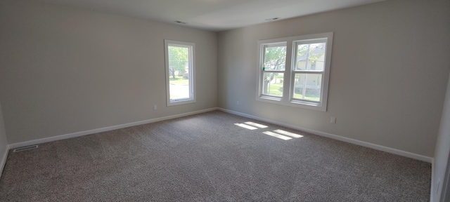 407 Allen St, Belvidere, IL 61008 - carpeted spare room with baseboards