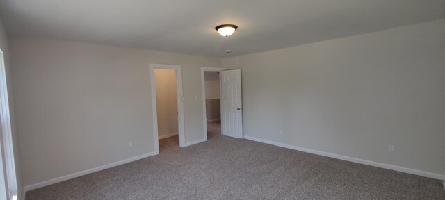 407 Allen St, Belvidere, IL 61008 - unfurnished bedroom with carpet and baseboards