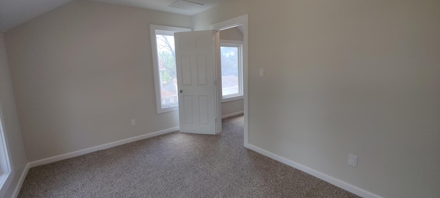 407 Allen St, Belvidere, IL 61008 - spare room featuring carpet and baseboards