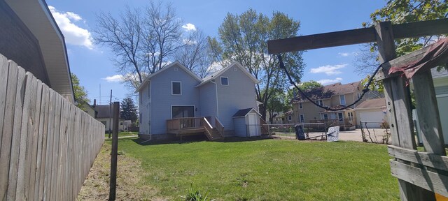 407 Allen St, Belvidere, IL 61008 - rear view of house with a deck and a residential view