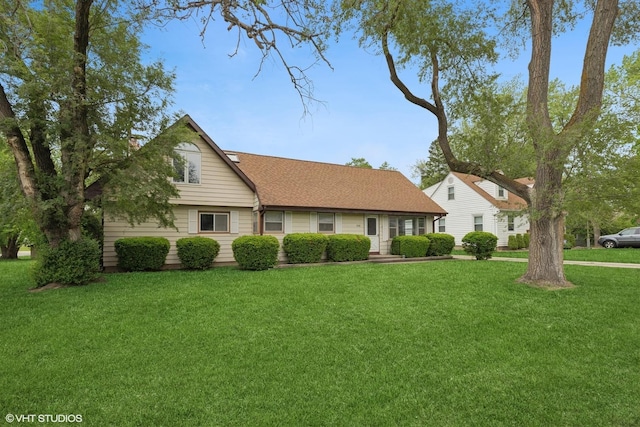 206 Villa Ave, Lake Villa, IL 60046 - view of front of property featuring a front yard and roof with shingles