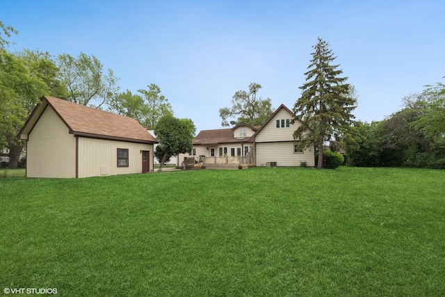 206 Villa Ave, Lake Villa, IL 60046 - view of green lawn featuring a deck and an outdoor structure