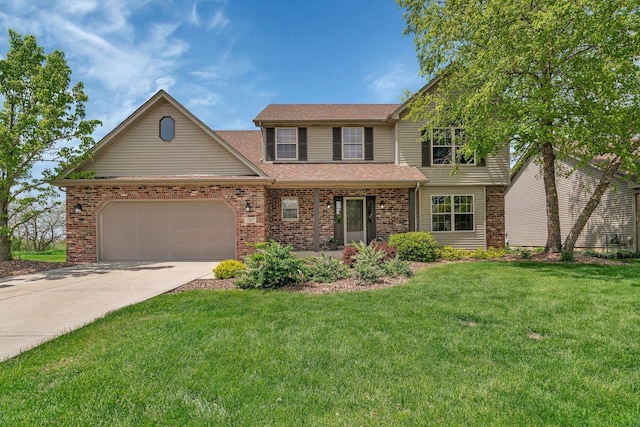 view of front facade with an attached garage, driveway, a front yard, and brick siding