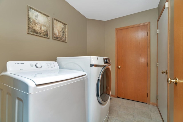 laundry area featuring independent washer and dryer