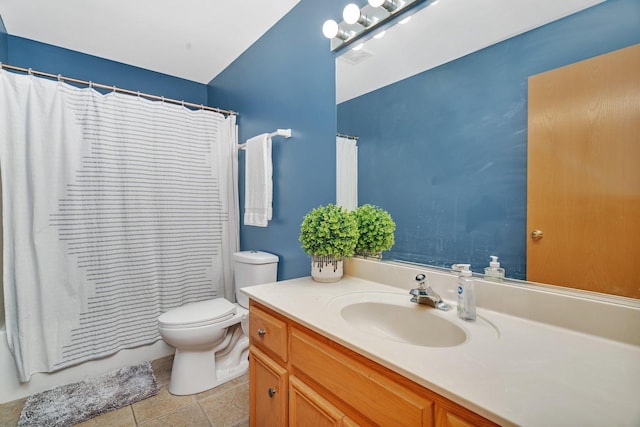 bathroom with vanity, toilet, and shower / tub combo