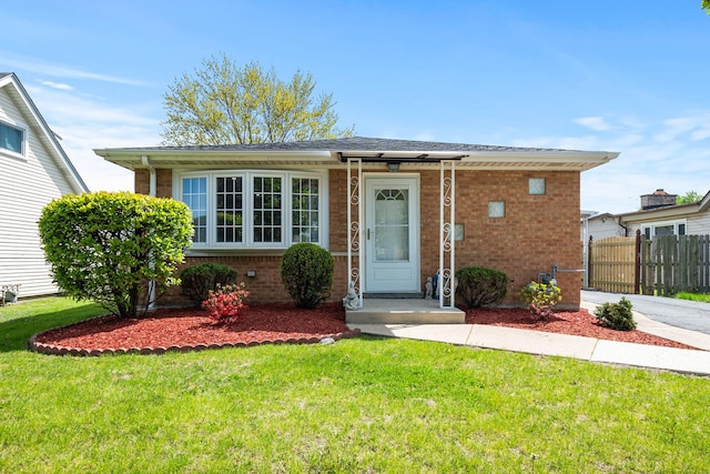 view of front of house with brick siding