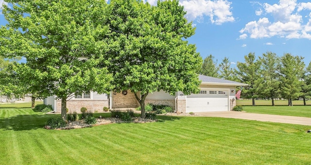 19 Nightingale Cir, Camargo, IL 61919 - obstructed view of property featuring brick siding, driveway, a garage, and a front lawn
