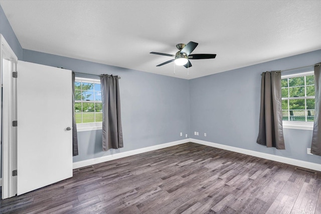 19 Nightingale Cir, Camargo, IL 61919 - unfurnished room with wood finished floors, baseboards, and a ceiling fan