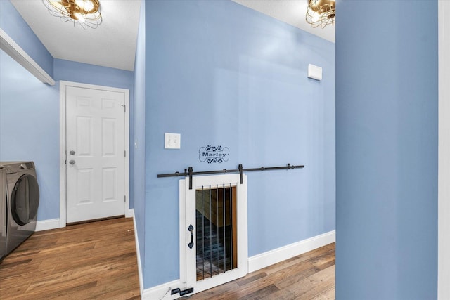 19 Nightingale Cir, Camargo, IL 61919 - clothes washing area with wood finished floors, washer / dryer, and baseboards