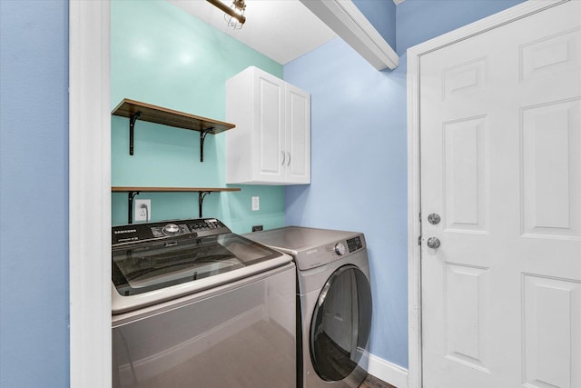 19 Nightingale Cir, Camargo, IL 61919 - laundry room with washing machine and dryer, cabinet space, and baseboards