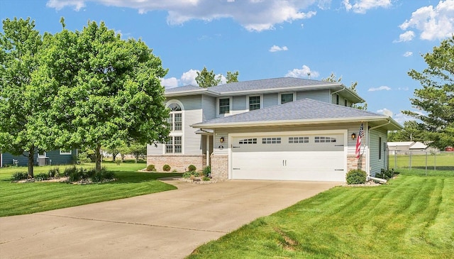 19 Nightingale Cir, Camargo, IL 61919 - view of front of home with a garage, driveway, and brick siding