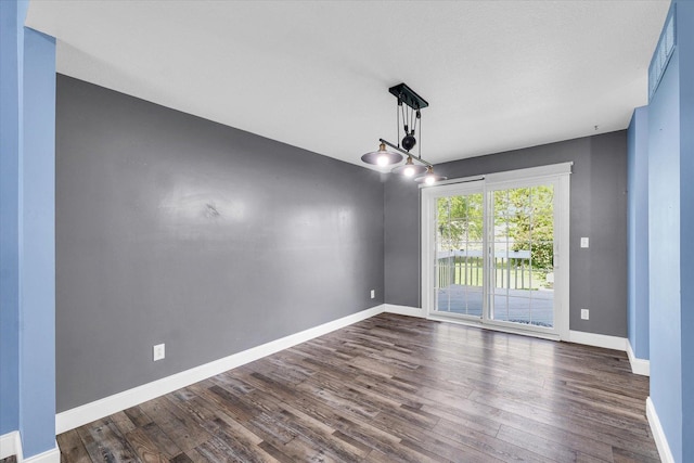 19 Nightingale Cir, Camargo, IL 61919 - unfurnished dining area featuring dark wood finished floors and baseboards
