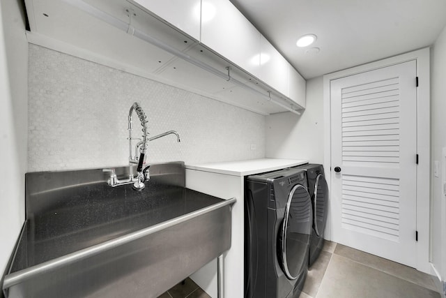 1324 Elmhurst Ln, Schaumburg, IL 60194 - laundry area with washer and clothes dryer and tile patterned flooring