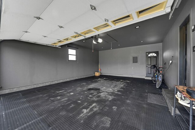 1324 Elmhurst Ln, Schaumburg, IL 60194 - garage featuring a garage door opener