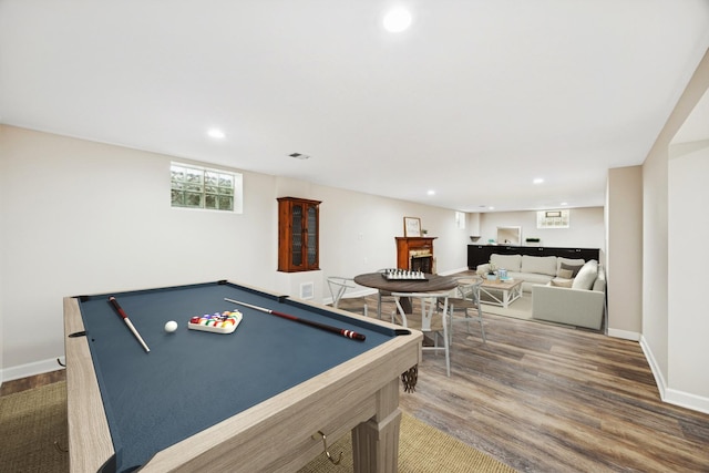 rec room with pool table, dark wood finished floors, recessed lighting, a fireplace, and baseboards