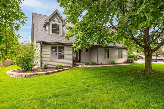 13362 S Golden Meadow Dr, Plainfield, IL 60585 - new england style home featuring a shingled roof and a front lawn