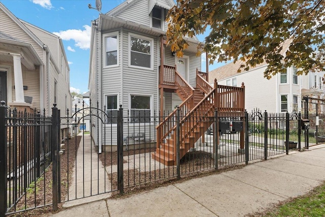 1808 N Karlov Ave, Chicago, IL 60639 - view of front of property featuring a fenced front yard and stairs