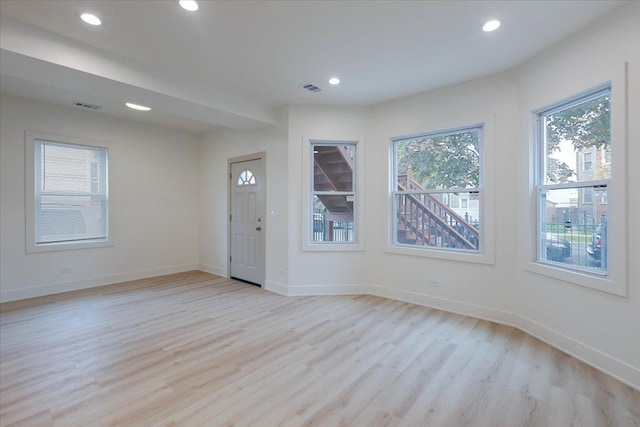 1808 N Karlov Ave, Chicago, IL 60639 - entryway with light wood-type flooring, recessed lighting, and baseboards
