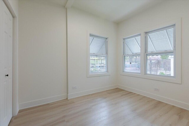 1808 N Karlov Ave, Chicago, IL 60639 - spare room featuring light wood finished floors and baseboards