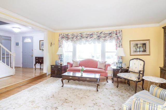 1054 Evergreen Dr, Carol Stream, IL 60188 - living room with wood finished floors, crown molding, stairs, and baseboards