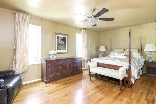 1054 Evergreen Dr, Carol Stream, IL 60188 - bedroom with light wood-style flooring, a ceiling fan, and baseboards