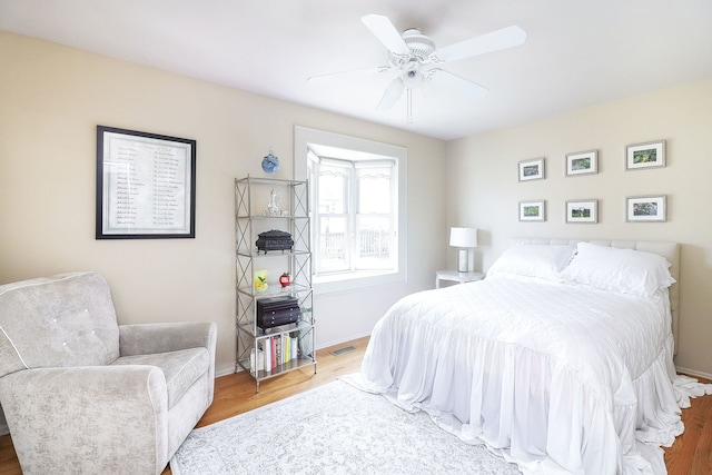 1054 Evergreen Dr, Carol Stream, IL 60188 - bedroom featuring wood finished floors, ceiling fan, and baseboards