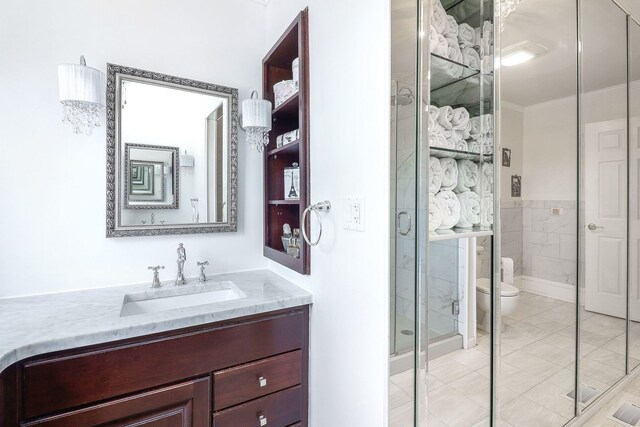 1054 Evergreen Dr, Carol Stream, IL 60188 - full bath with toilet, a shower stall, vanity, crown molding, and tile patterned flooring