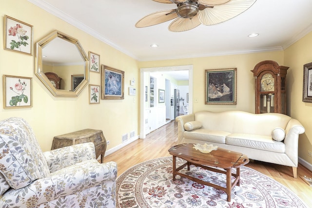 1054 Evergreen Dr, Carol Stream, IL 60188 - living area with light wood-style floors, ceiling fan, crown molding, baseboards, and recessed lighting