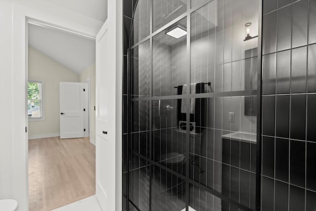 250 N Oak St, Palatine, IL 60067 - full bathroom with a shower stall, wood finished floors, vaulted ceiling, and baseboards