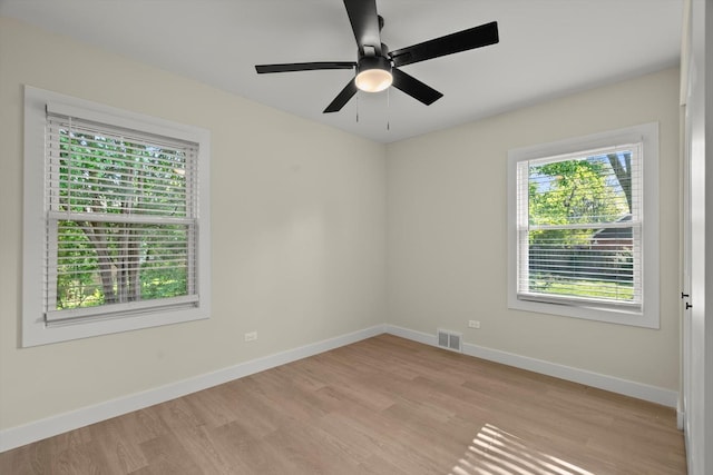 250 N Oak St, Palatine, IL 60067 - empty room with light wood finished floors, baseboards, and ceiling fan