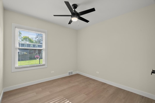 250 N Oak St, Palatine, IL 60067 - spare room featuring light wood finished floors, baseboards, and a ceiling fan