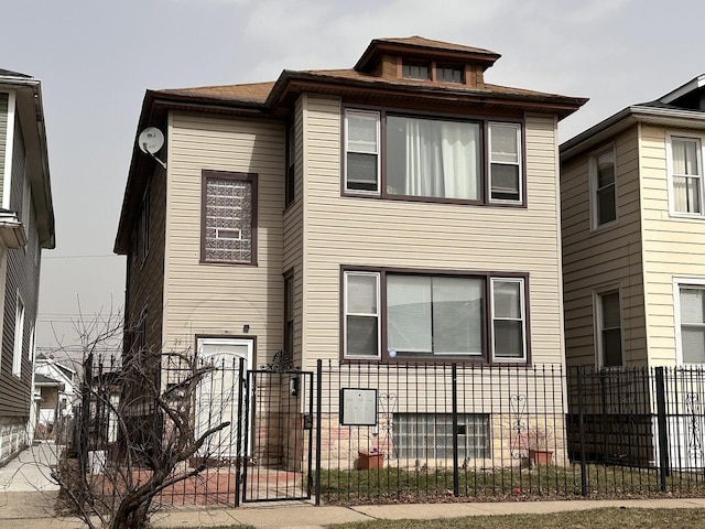view of front facade with a fenced front yard