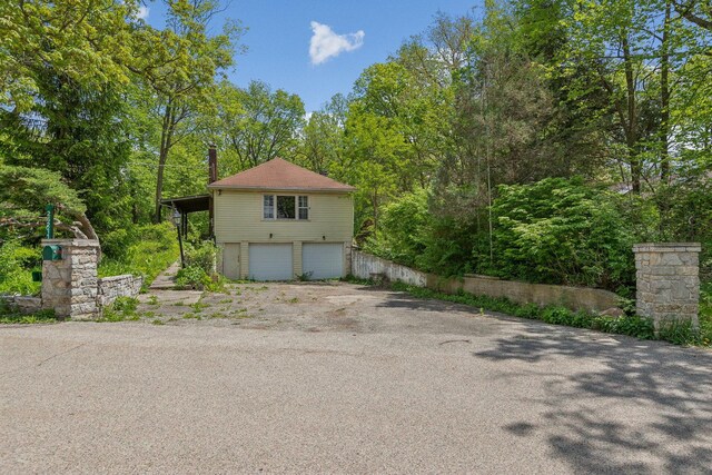 26211 W Spring Grove Rd, Antioch, IL 60002 - view of front of property featuring a garage and driveway