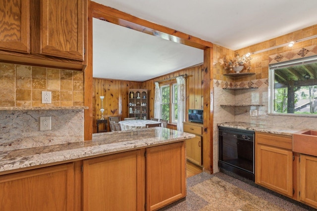 26211 W Spring Grove Rd, Antioch, IL 60002 - kitchen with black appliances, backsplash, light stone countertops, brown cabinets, and granite floors