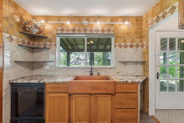 26211 W Spring Grove Rd, Antioch, IL 60002 - kitchen with dishwasher, a sink, open shelves, and healthy amount of natural light